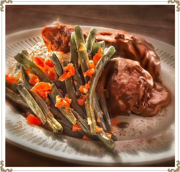 Recette de Pilons de poulet en sauce épicée au chocolat sans gluten et sans produits laitiers de Cuisine l'Angélique.